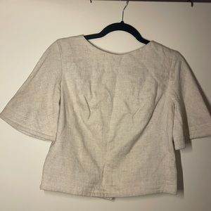 Sturdy vintage linen crop with button down back